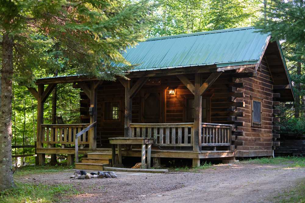 A campground cabin surrounded by trees